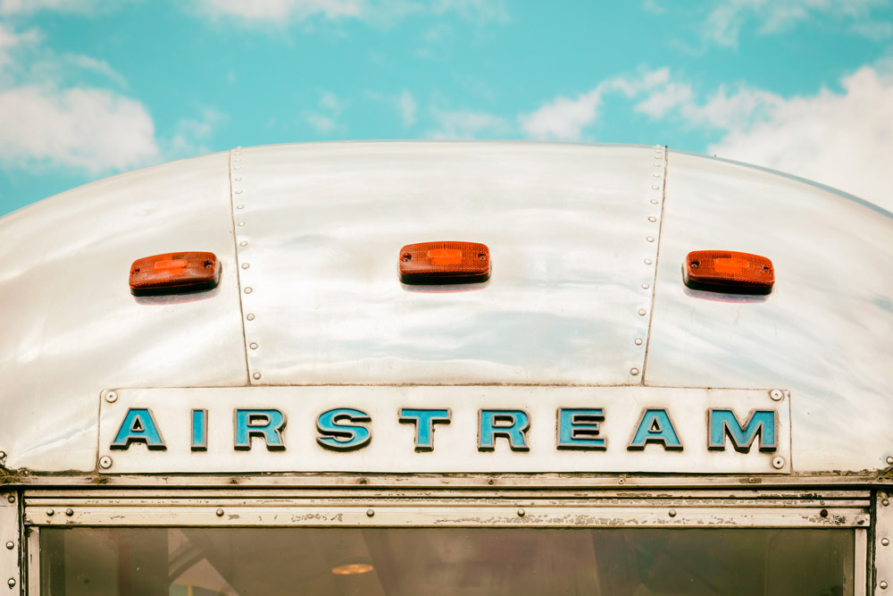 A close up of the Airstream logo on the rear of an Airstream RV. KA RV is the best Orlando Airstream body repair shop.
