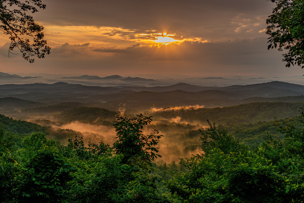 Sunset over the mountains in Blue Ridge, Georgia is a great spot for fall RV trips
